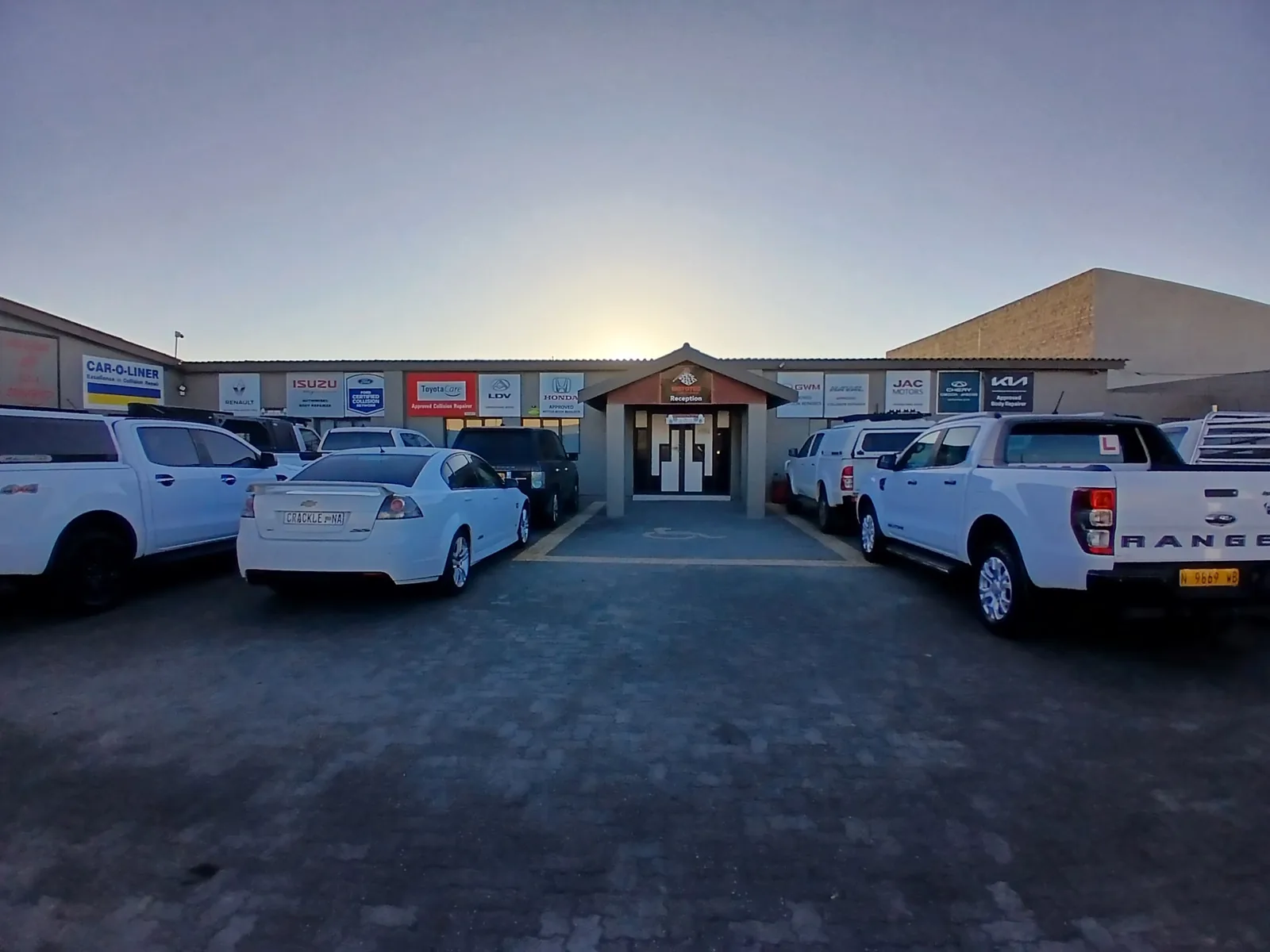 Front of the Mototec Swakopmund workshop on Manduma Ya Ndemufayo Street, with vehicles in the yard